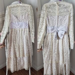 Vintage lace dress with pale blue ribbon